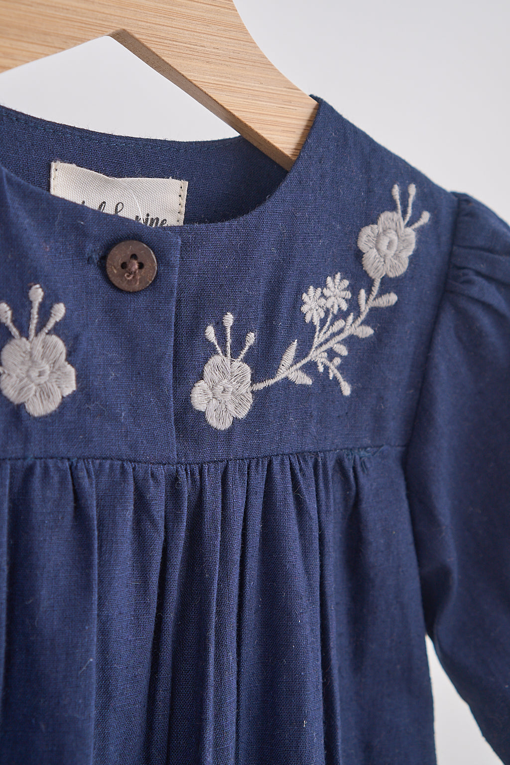 Navy floral embroidery linen girl romper